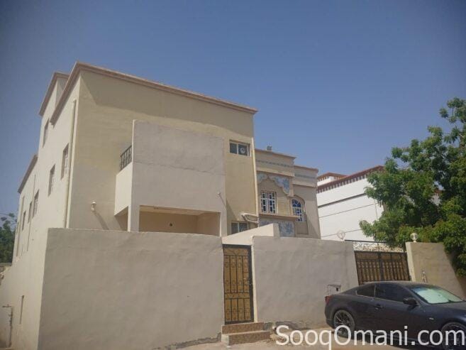 Two adjacent houses for sale on one plot of land