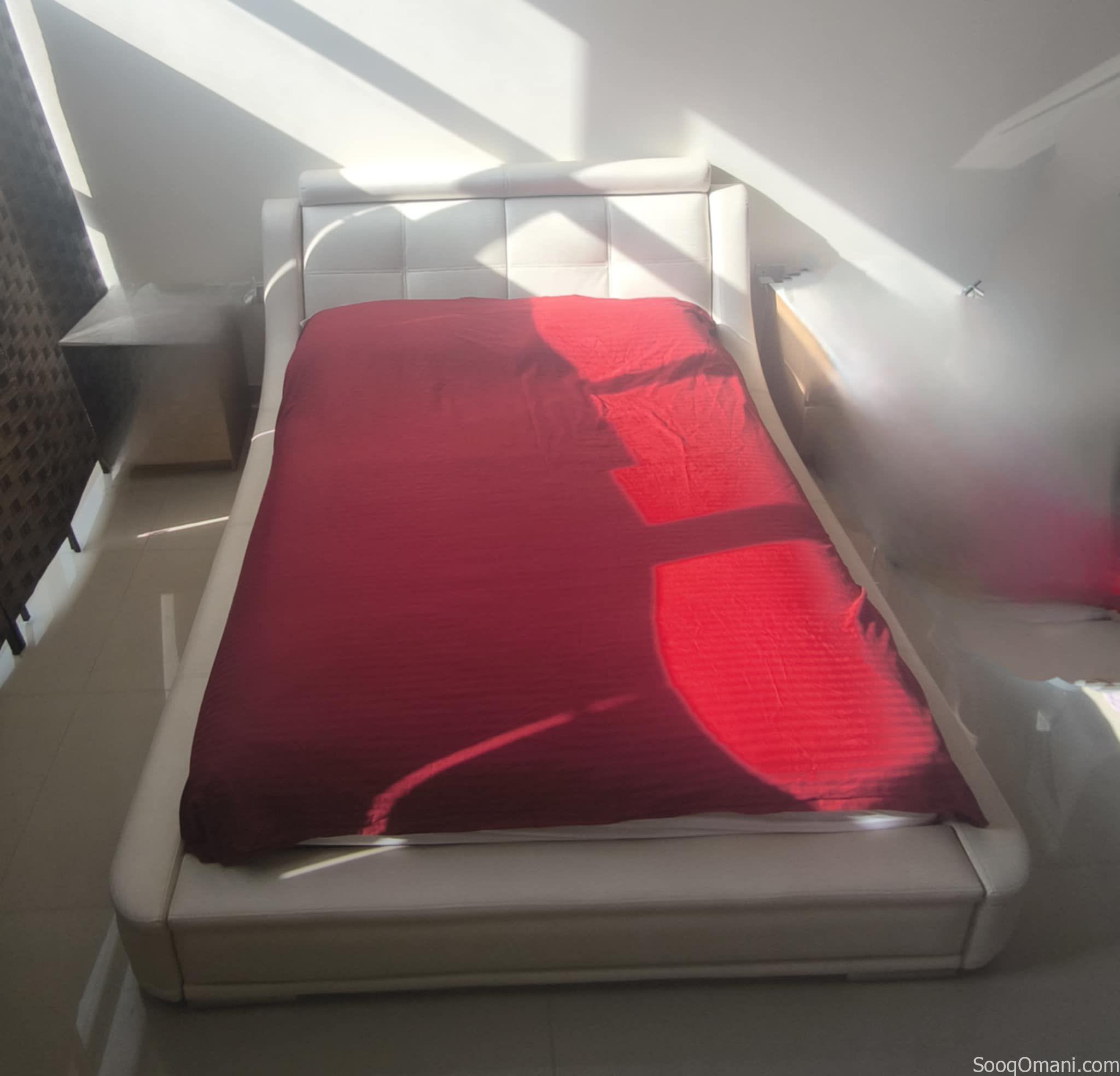 Queen size bed with medical spa mattress