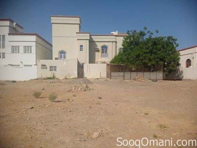 Two adjacent houses for sale on one plot of land