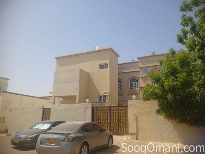 Two adjacent houses for sale on one plot of land