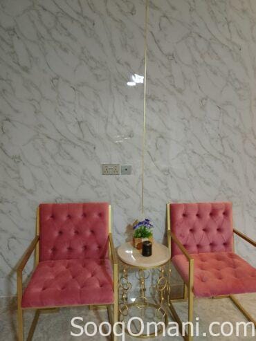 Two chairs and a marble table for sale
