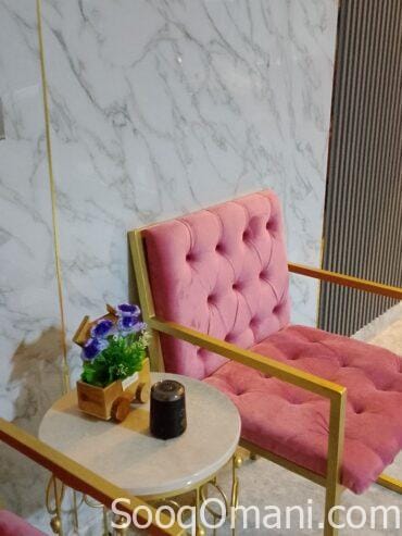 Two chairs and a marble table for sale