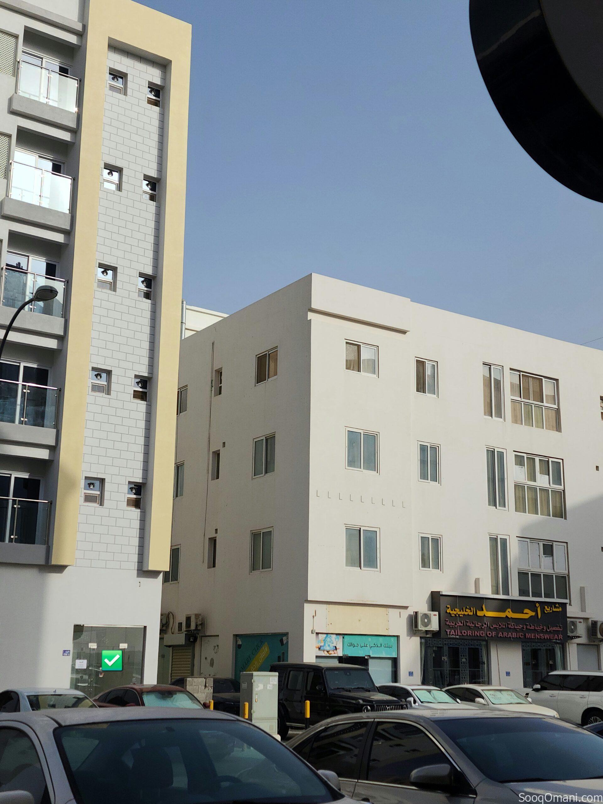 Corner shop for sale in a new building in Al Khoud 6