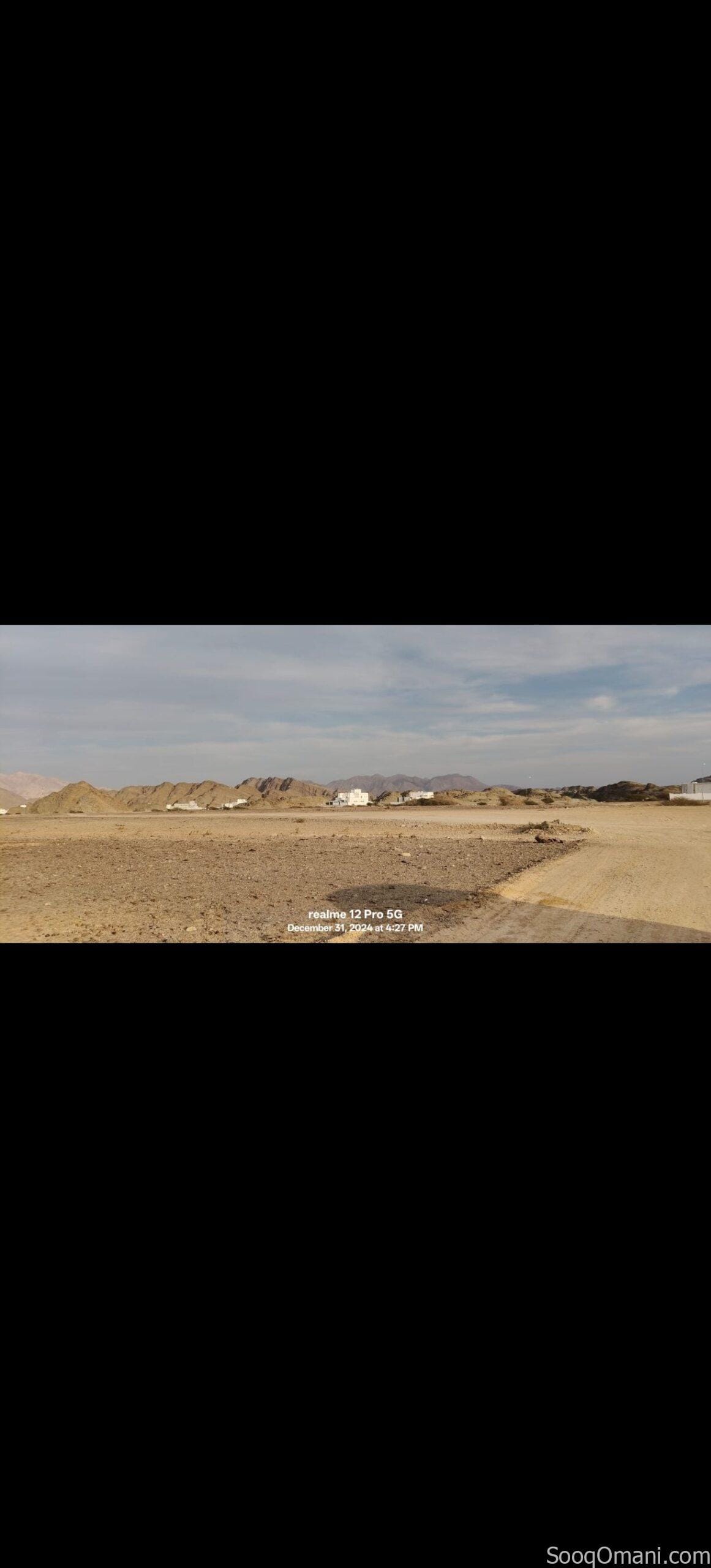 Residential commercial land for sale in Al Amarat, Al Nahda Extension 1; prime location.