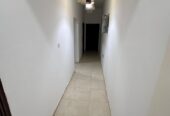 For rent, a clean and spacious apartment on the first floor in a residential building in South Maabela, near Al Safa Roundabout.