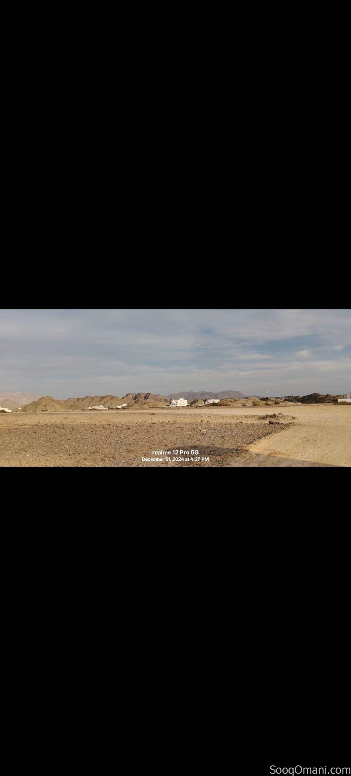 Residential commercial land for sale in Al Amarat, Al Nahda Extension 1; prime location.