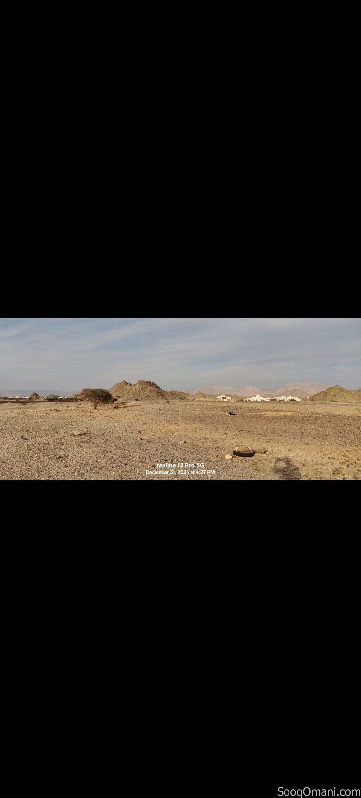 Residential commercial land for sale in Al Amarat, Al Nahda Extension 1; prime location.