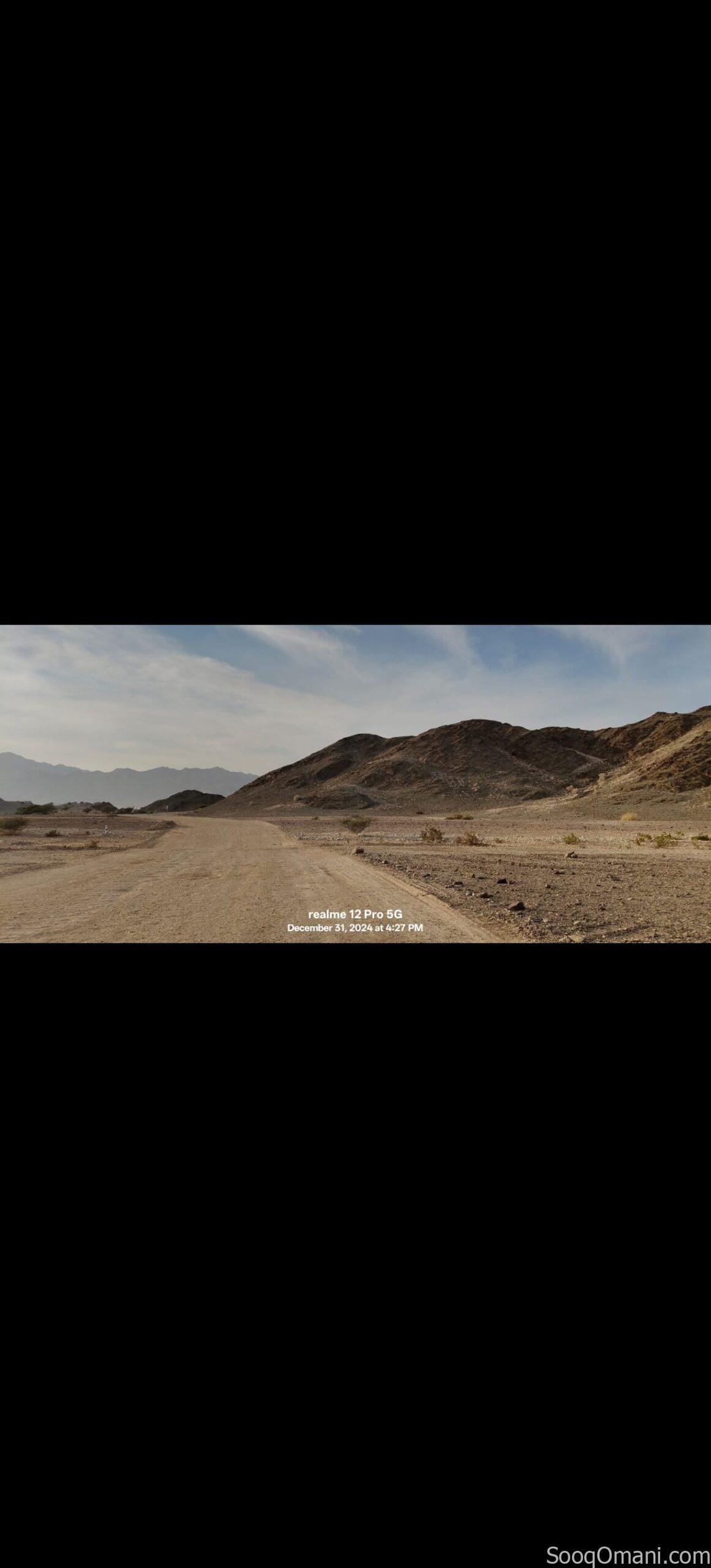 Residential commercial land for sale in Al Amarat, Al Nahda Extension 1; prime location.