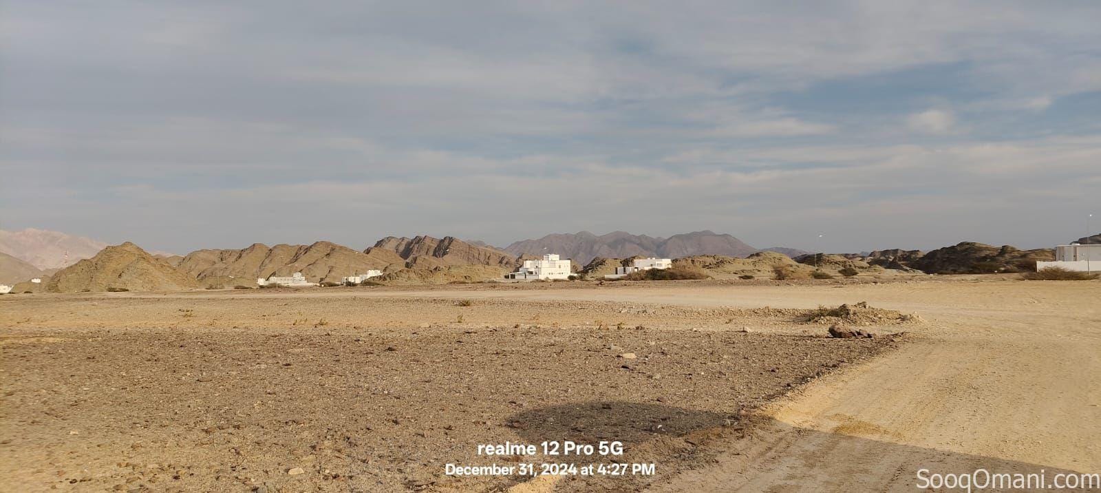 For sale, residential and commercial land in Al Nahda City, First Extension