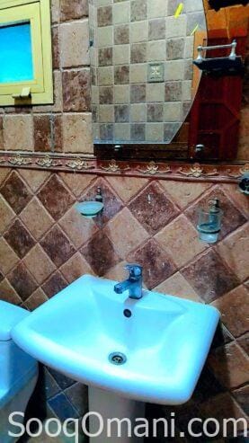 Room, bathroom and small kitchen in Al-Maabela