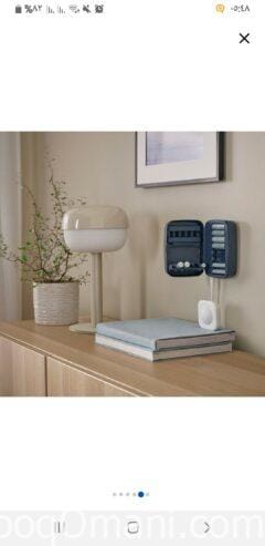 Rechargeable battery charger with storage