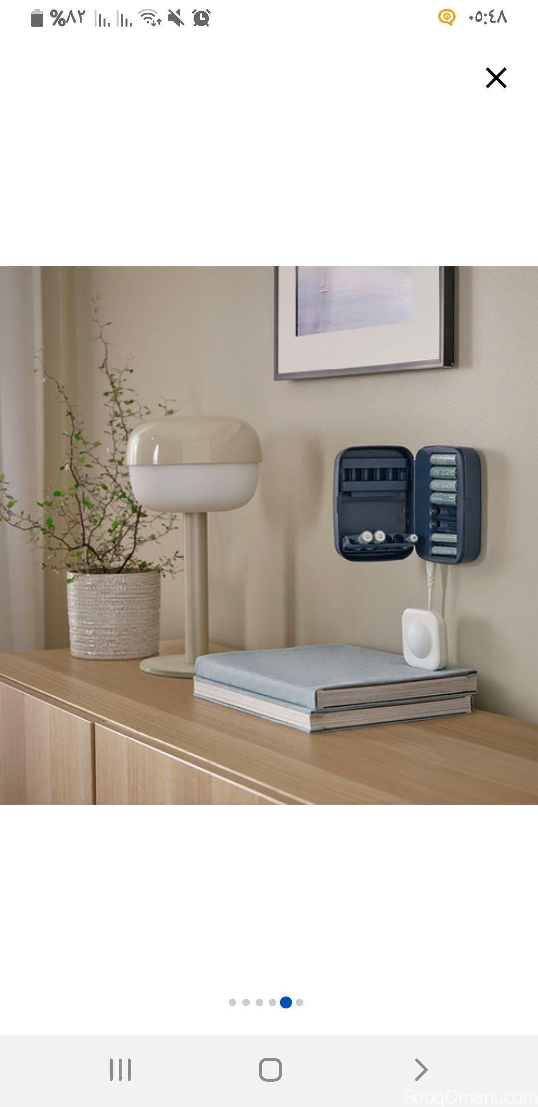 Rechargeable battery charger with storage