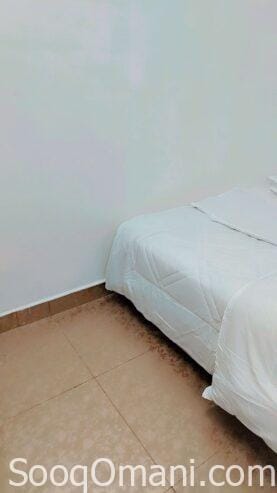Room, bathroom and small kitchen in Al-Maabela
