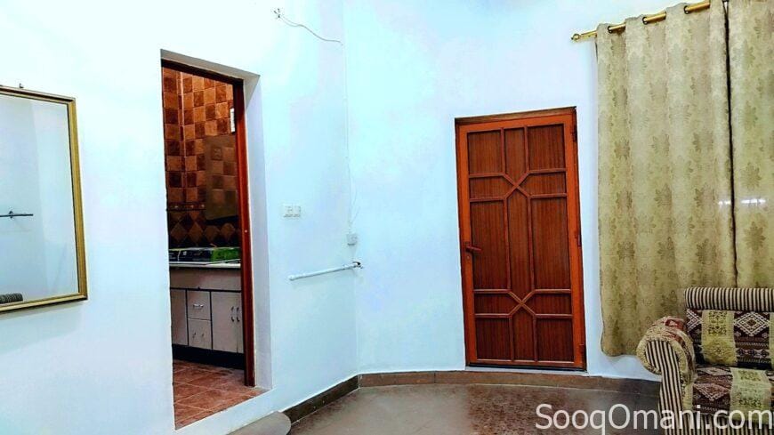 Room, bathroom and small kitchen in Al-Maabela