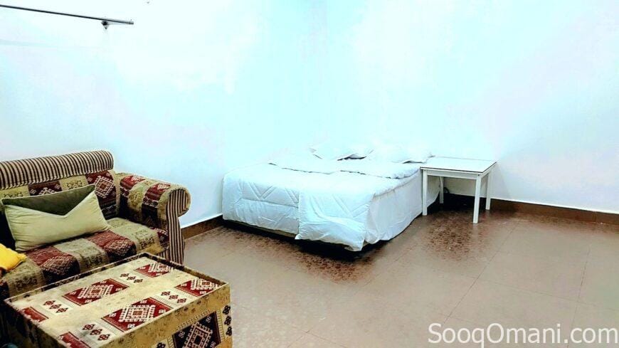 Room, bathroom and small kitchen in Al-Maabela