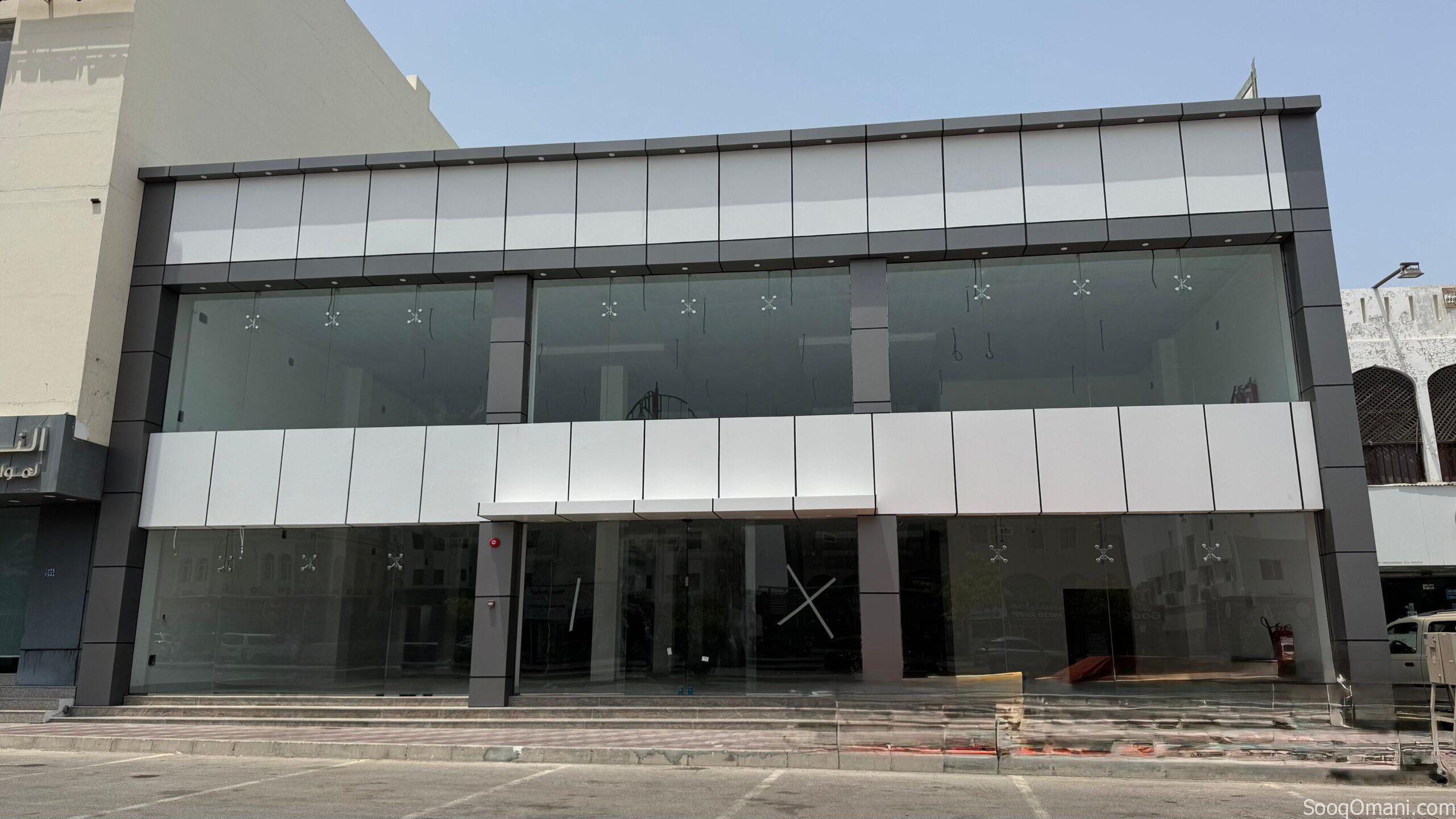 For rent, a new commercial building in a vital location in Al-Khoudh Market, near Al-Sanaa Medical Clinic