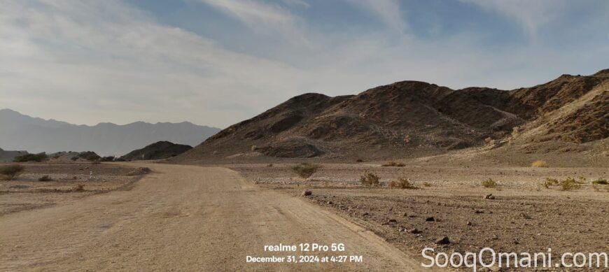 For sale, residential and commercial land in Al Nahda City, First Extension