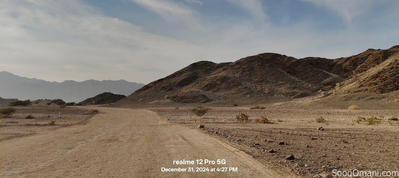 For sale, residential and commercial land in Al Nahda City, First Extension