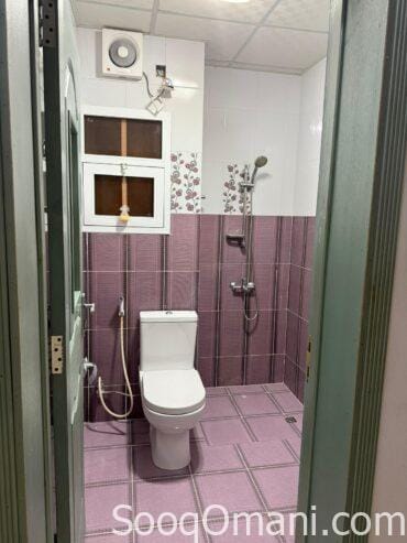 For rent an excellent apartment in an excellent location in Al Khoud on Al Sadd Street, near Al Afak Hotel Apartments and Fikra Library