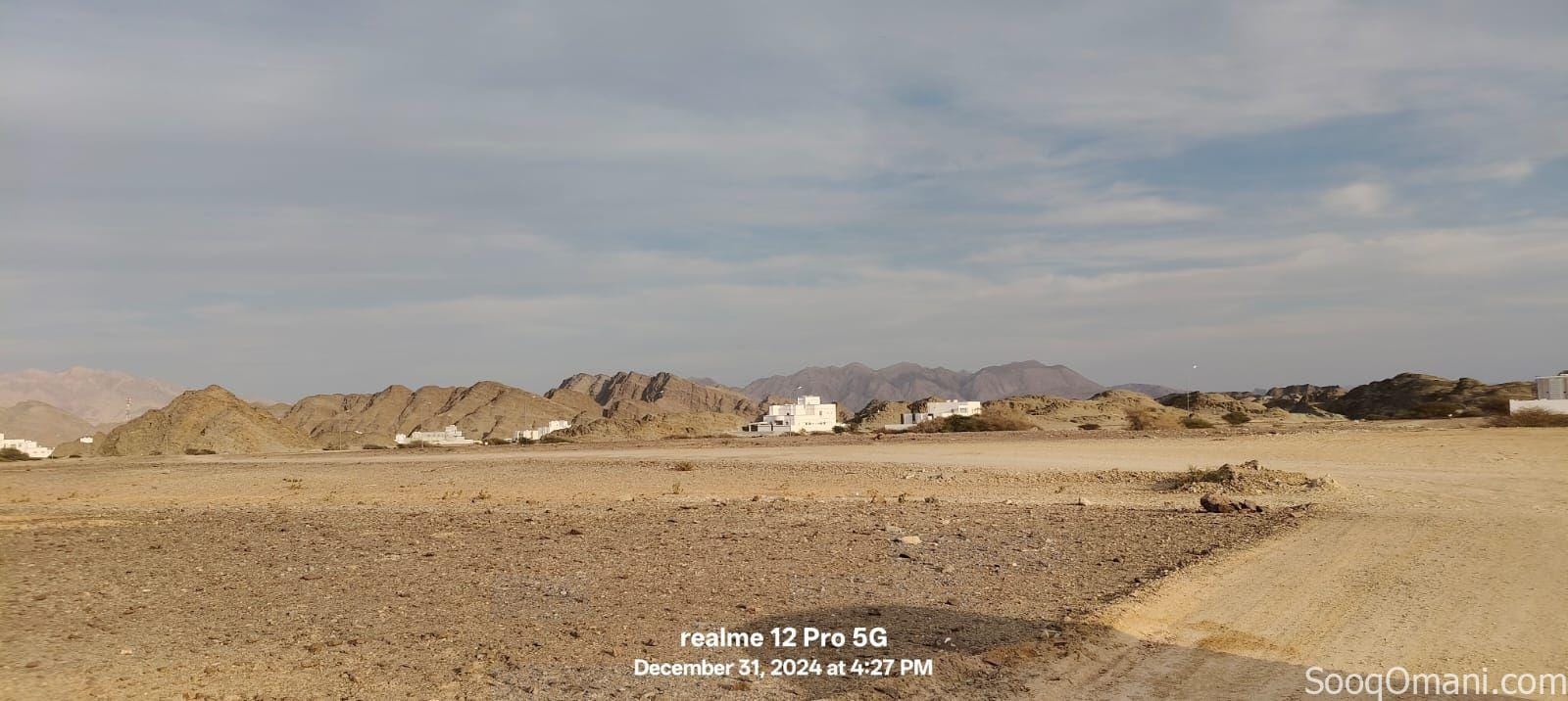 For sale, residential and commercial land in Al Nahda City, First Extension