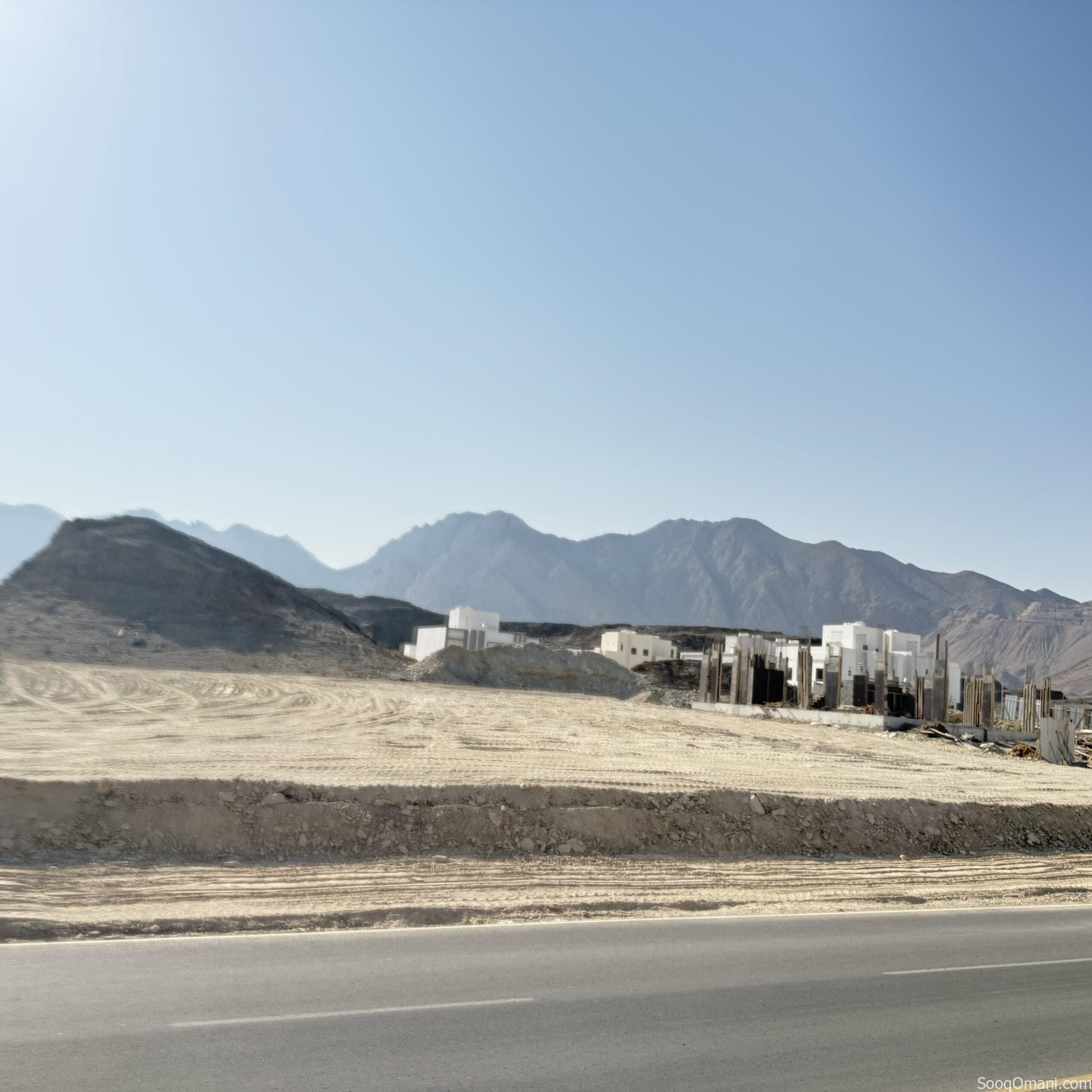 I am the owner, Al Amerat 8/1 adjacent to Al Amerat Heights 2, suitable for building a twin villa
