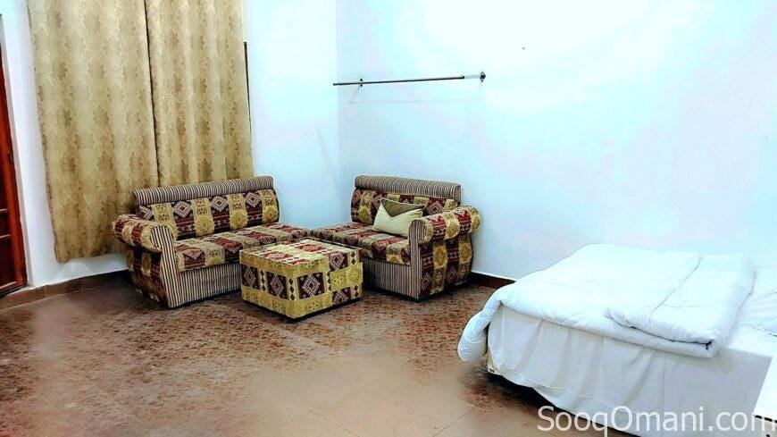 Room, bathroom and small kitchen in Al-Maabela