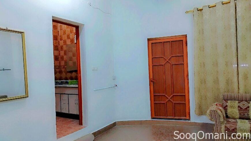 Room, bathroom and small kitchen in Al-Maabela