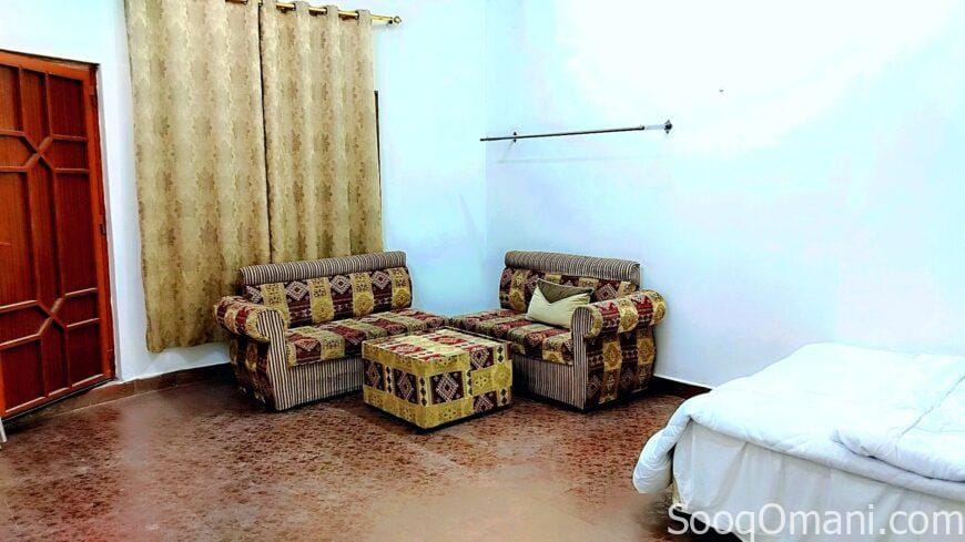 Room, bathroom and small kitchen in Al-Maabela