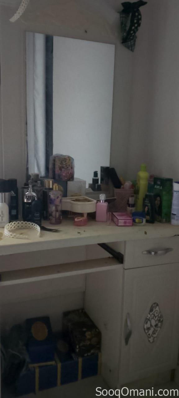 Bedroom, sofas, and rugs