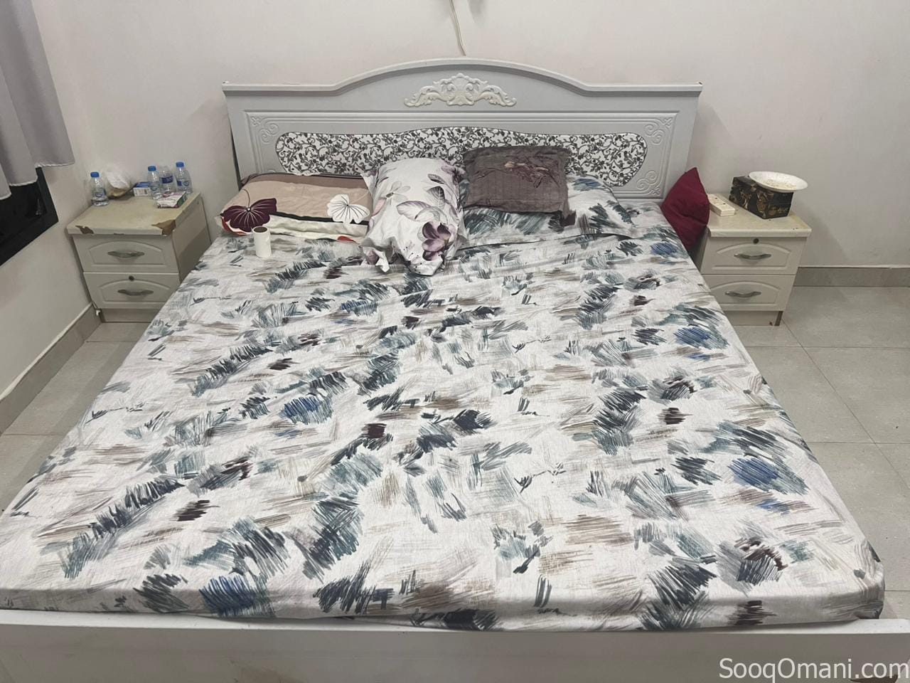 Bedroom, sofas, and rugs