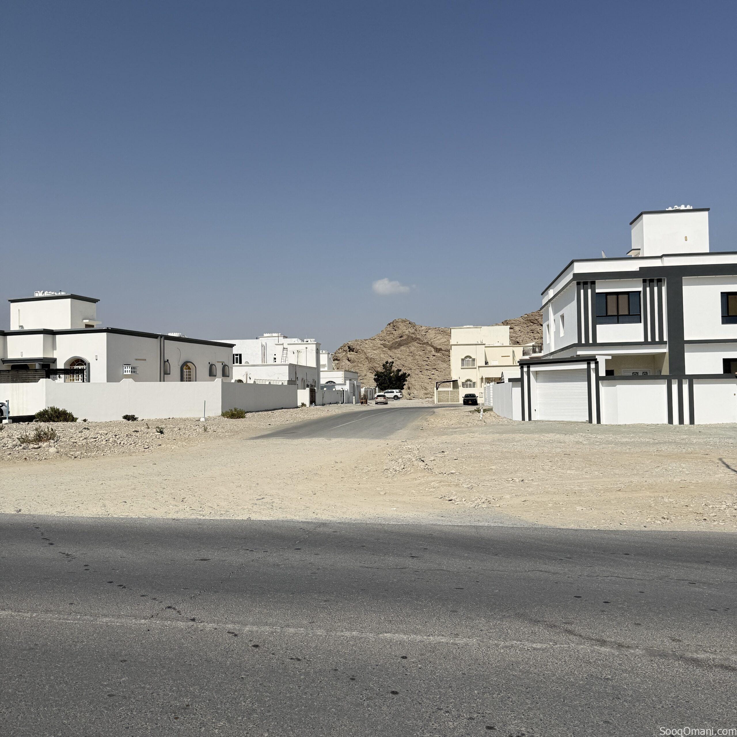 I am the owner, a plot of land in Al Amerat, Block 11/1