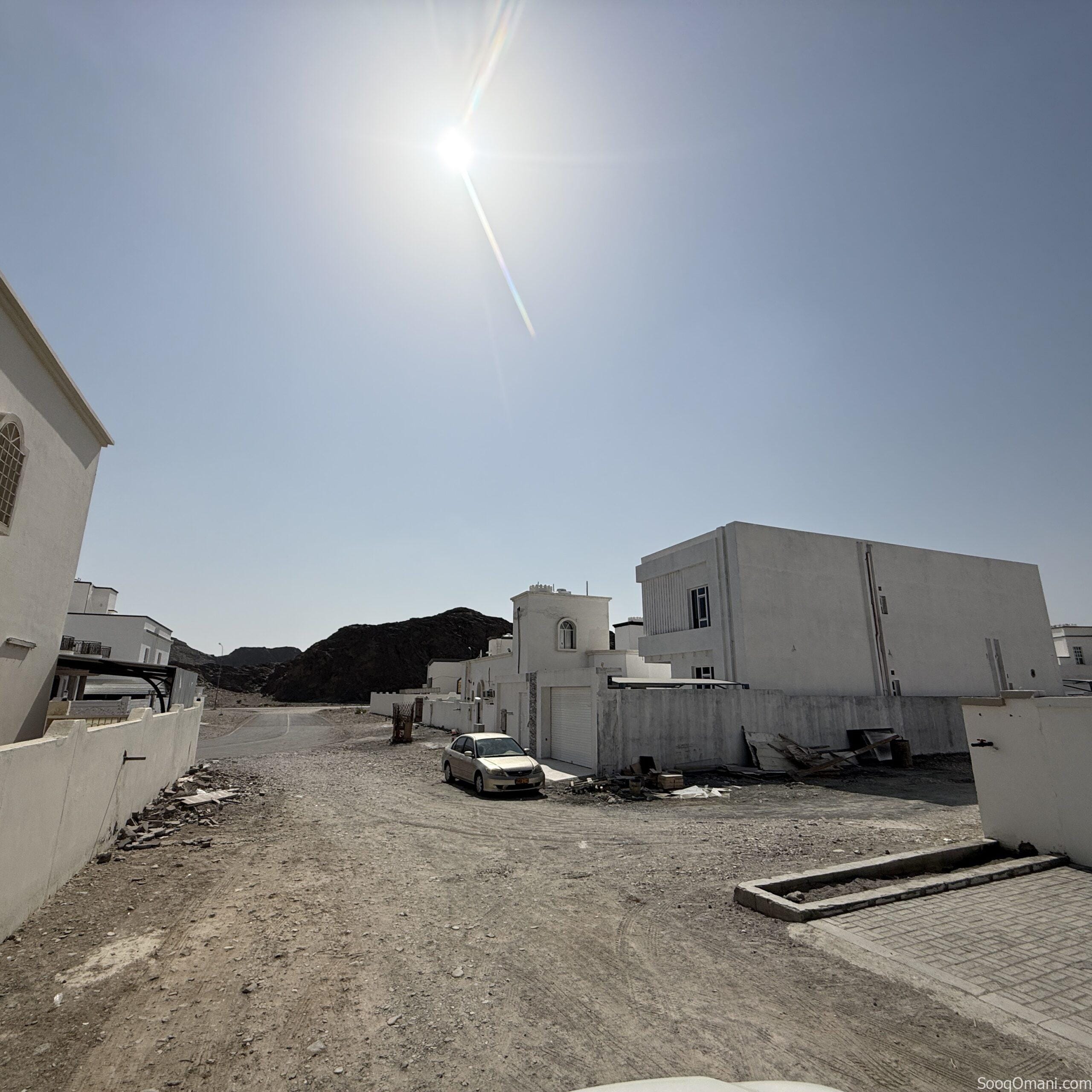 I am the owner, a plot of land in Al Amerat, Block 11/1