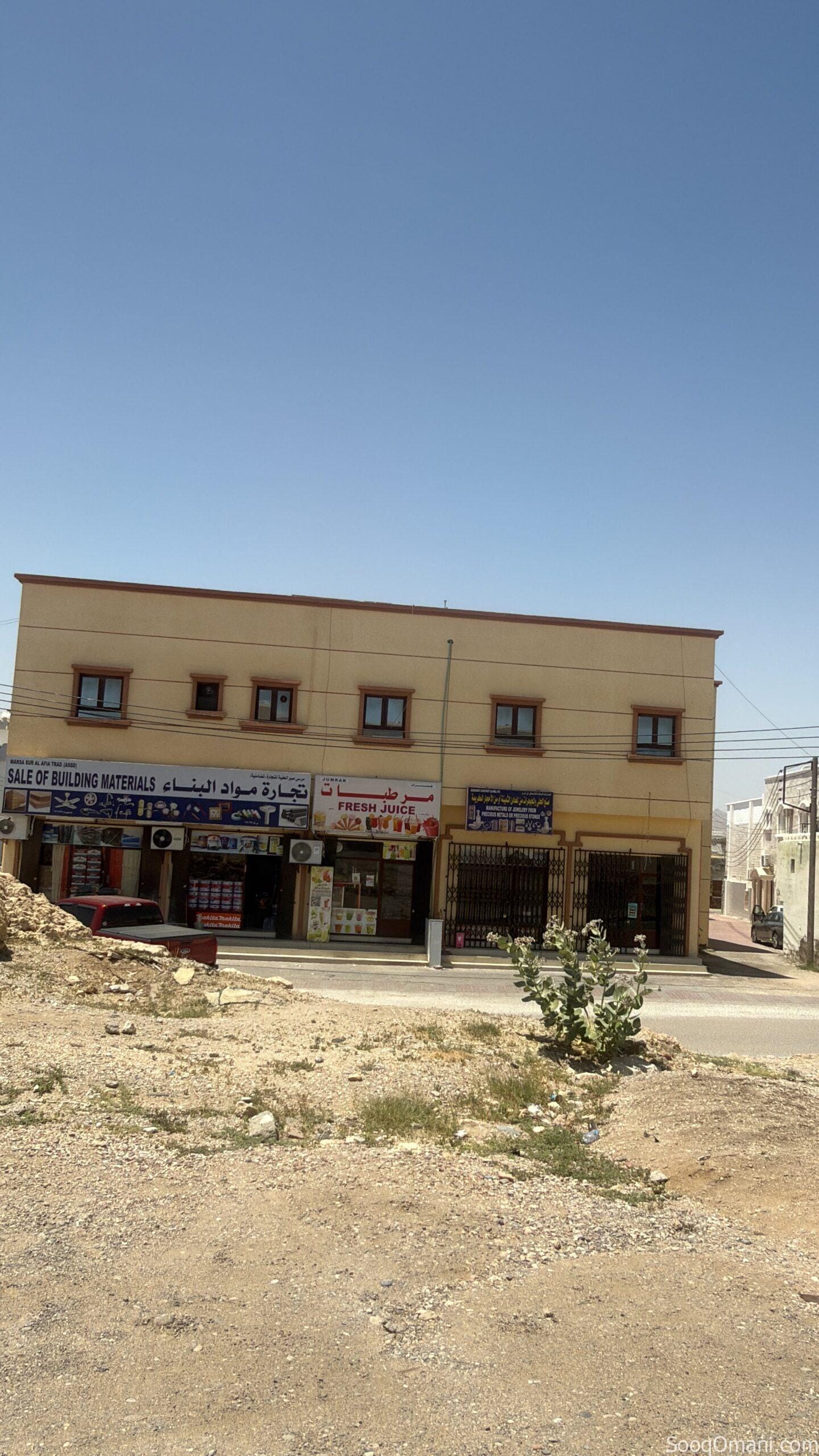 Two-story residential/commercial building for sale near the market in Qurha