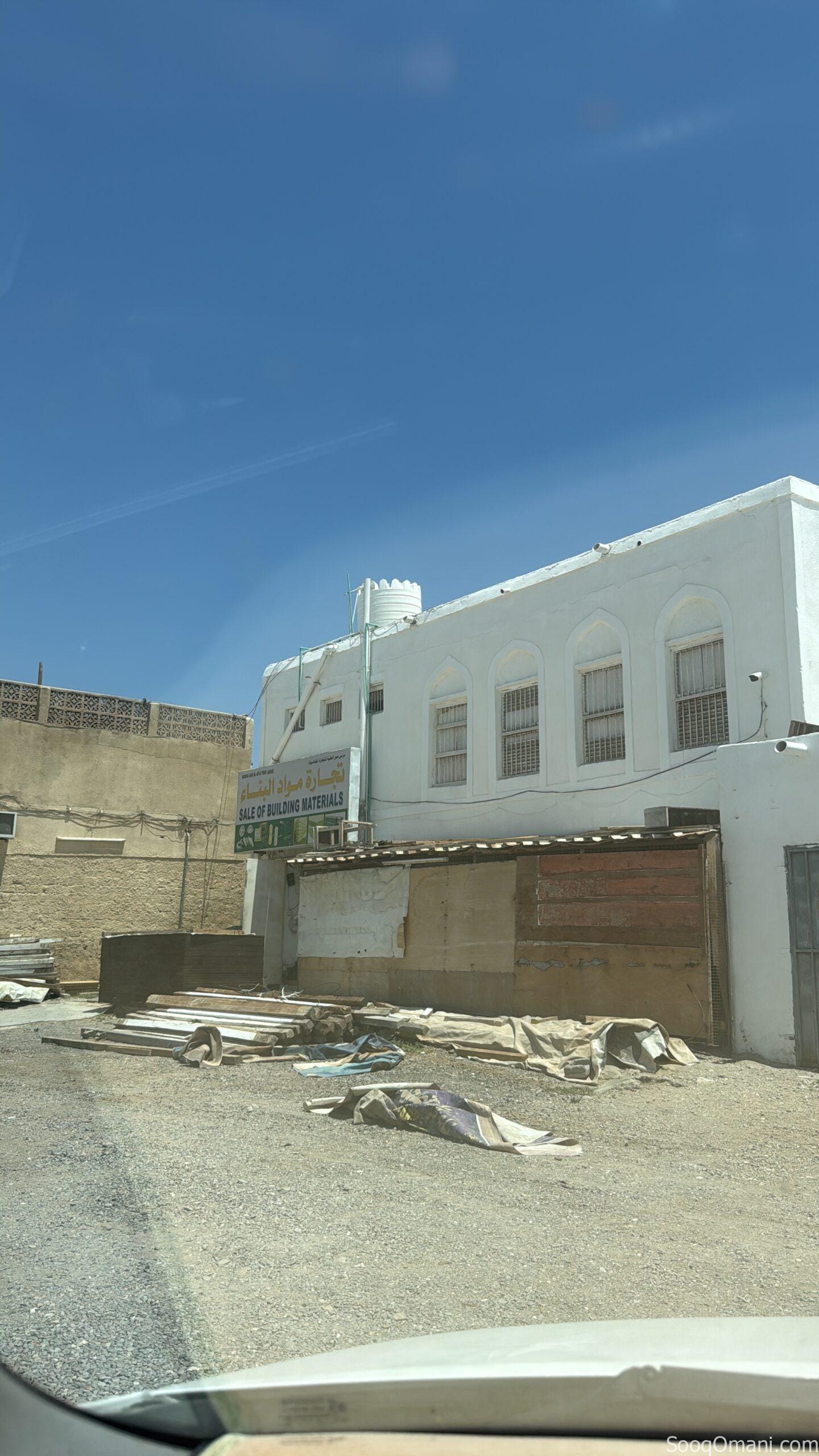 Two-story residential/commercial building for sale near the market in Qurha