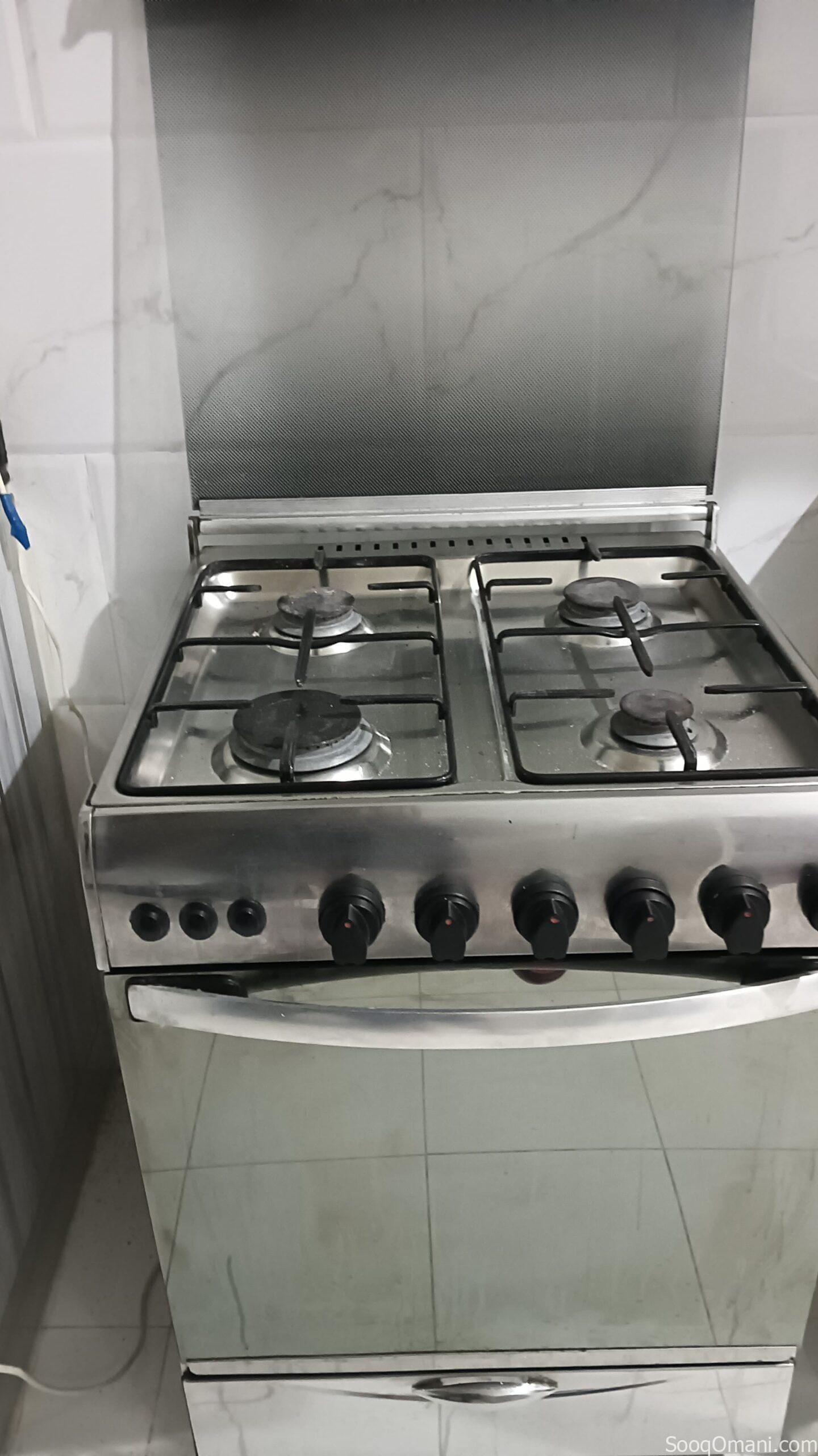 Four-burner stove, very lightly used, for sale