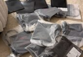 Inflatable wedge for emergency car door unlocking