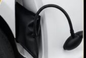Inflatable wedge for emergency car door unlocking